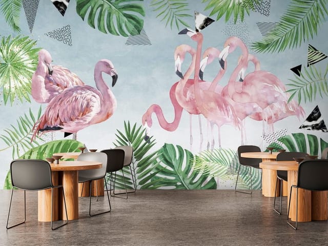 Fototapeta Flamingi – grupa różowych flamingów wśród liści