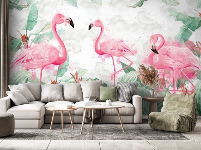 Fototapeta Flamingi – trzy różowe flamingi otoczone zielonymi liśćmi i kwiatami