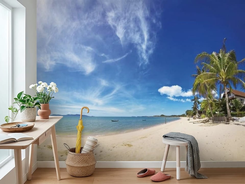 Fototapeta z piaszczystą plażą, palmami i błękitnym niebem - widok na ścianę w przedpokoju