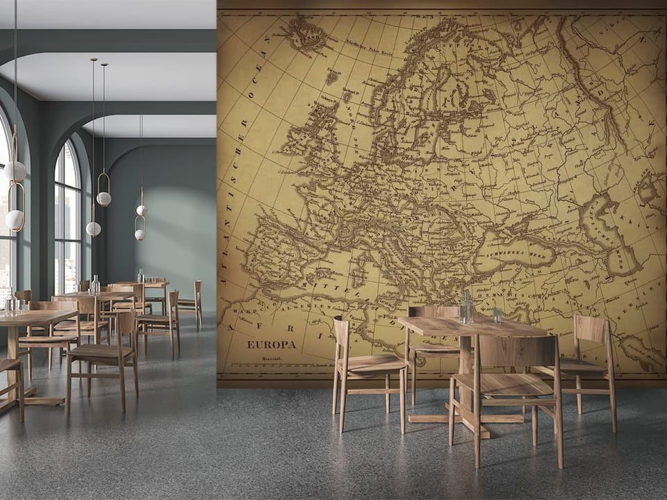 Fototapeta przedstawiająca starą mapę Europy z konturami i niemieckimi napisami - ściana w przytulnej kawiarni