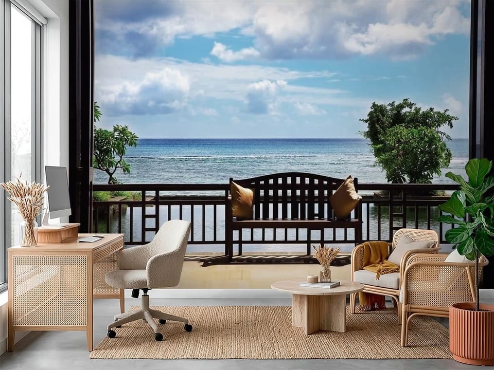 Fototapeta z drewnianą ławką na tarasie z widokiem na ocean i bujną roślinnością - dekoracja ściany w biurze w ciepłych kolorach