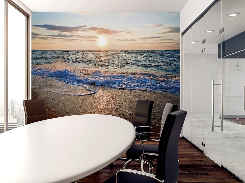 Fototapeta Zachód słońca nad morzem we wnętrzu biura