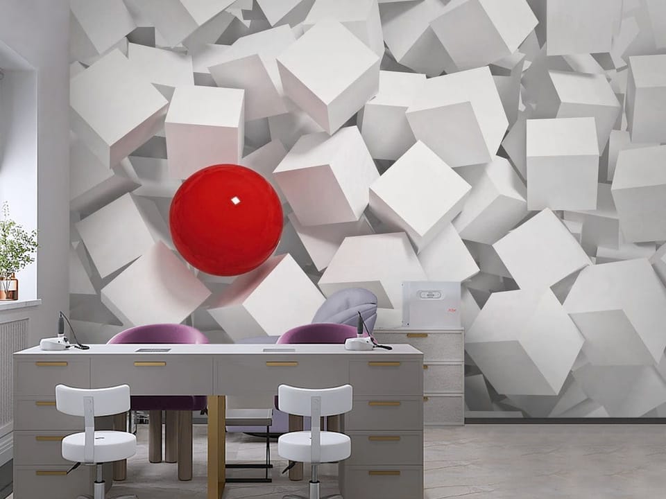 Fototapeta z czerwoną kulą wśród białych sześcianów, geometryczne kształty - aranżacja ściany w biurze