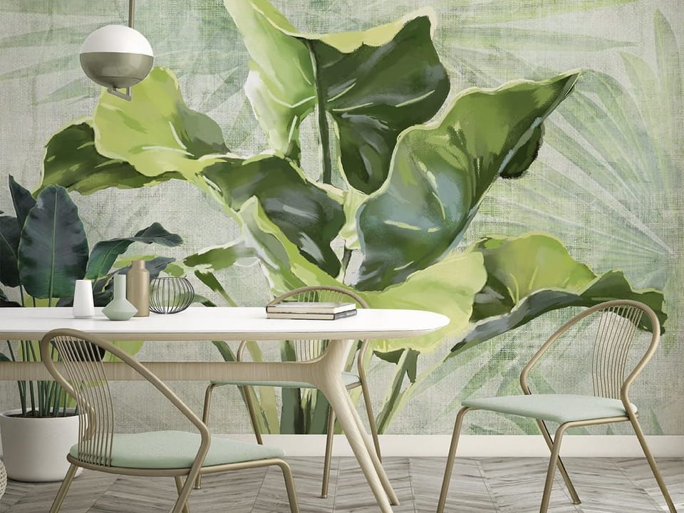 Fototapeta Zielone liście na jasnym tle we wnętrzu kuchni