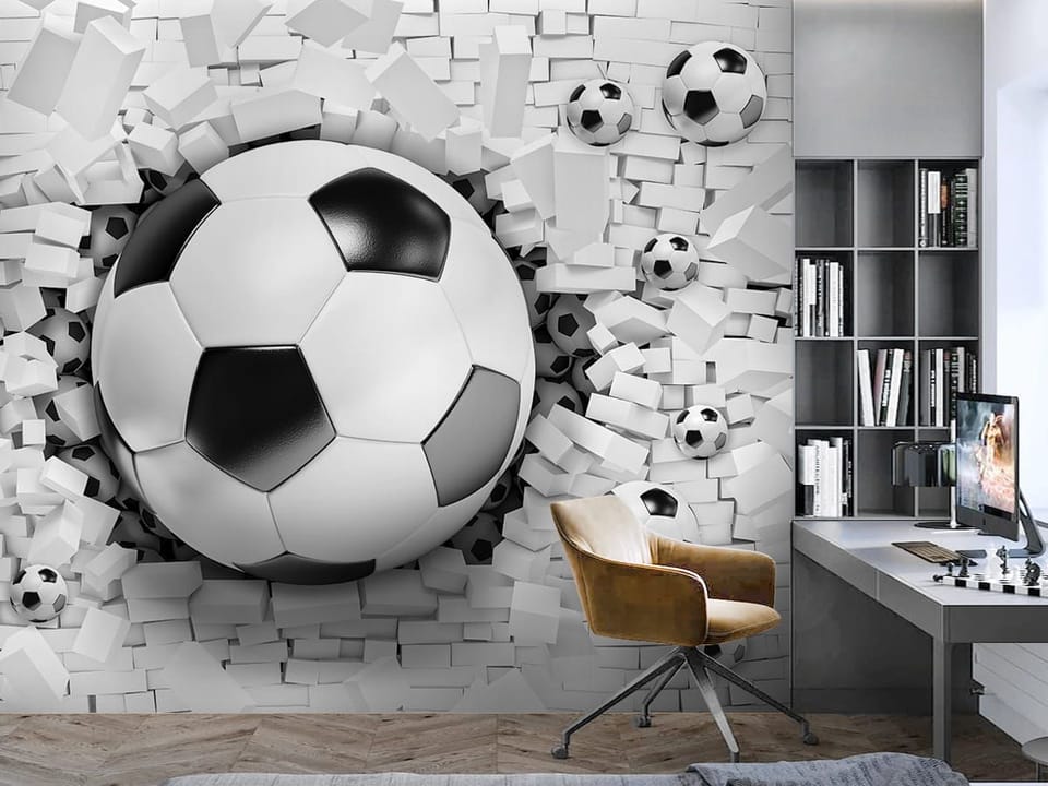 Fototapeta Piłka Nożna i Rozbita Ściana we wnętrzu pokoju nastolatka