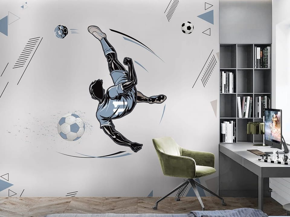 Fototapeta Piłkarz w przewrotce na jasnym tle we wnętrzu pokoju nastolatka