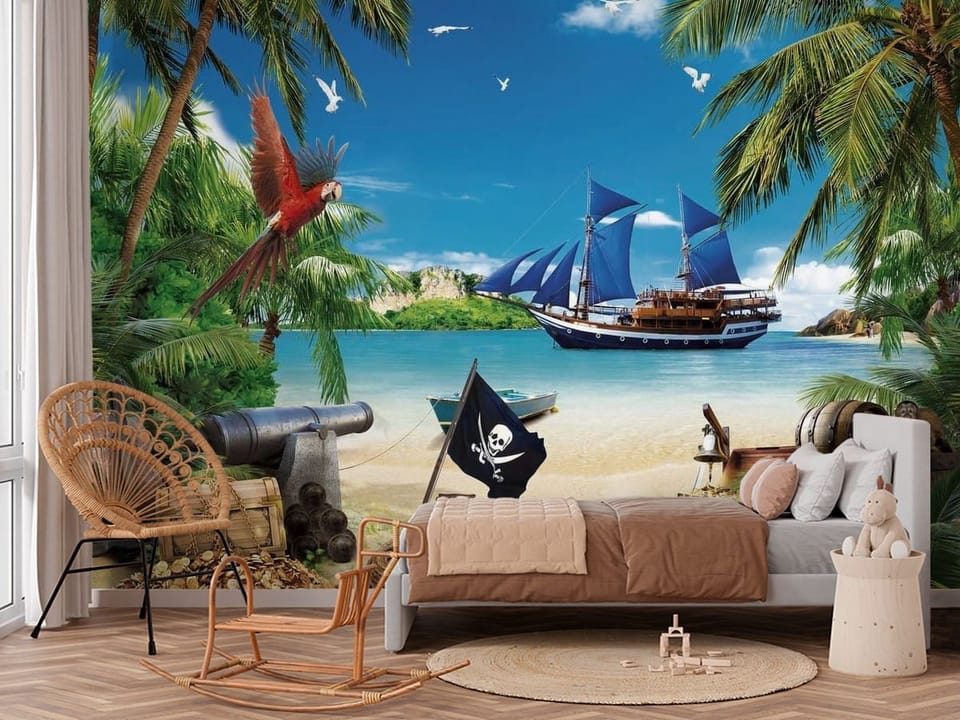 Fototapeta z żaglowcem na morzu, plażą z palmami, armatą i skarbem - aranżacja w przytulnym pokoju dziecięcym