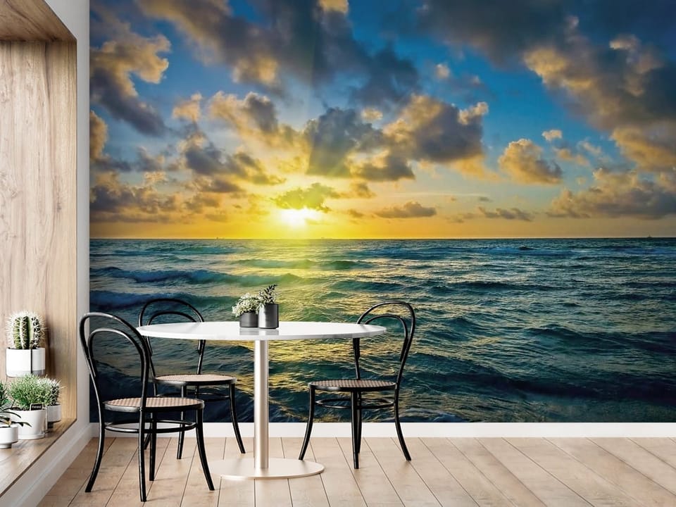Fototapeta z zachodem słońca nad oceanem, fale i chmury - aranżacja ściany przy stole w kuchni