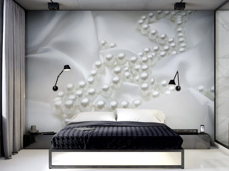 Fototapeta Perły na białym materiale we wnętrzu sypialni