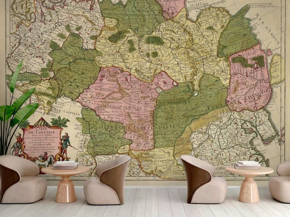 Fototapeta przedstawiająca starą mapę geograficzną Tartarii z kolorowymi regionami i ozdobną ramką. - widok na ścianę w nowoczesnej kawiarni