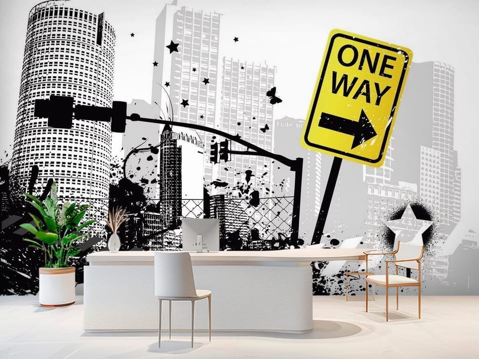 Fototapeta z żółtym znakiem One Way i miejską panoramą - aranżacja w nowoczesnym biurze