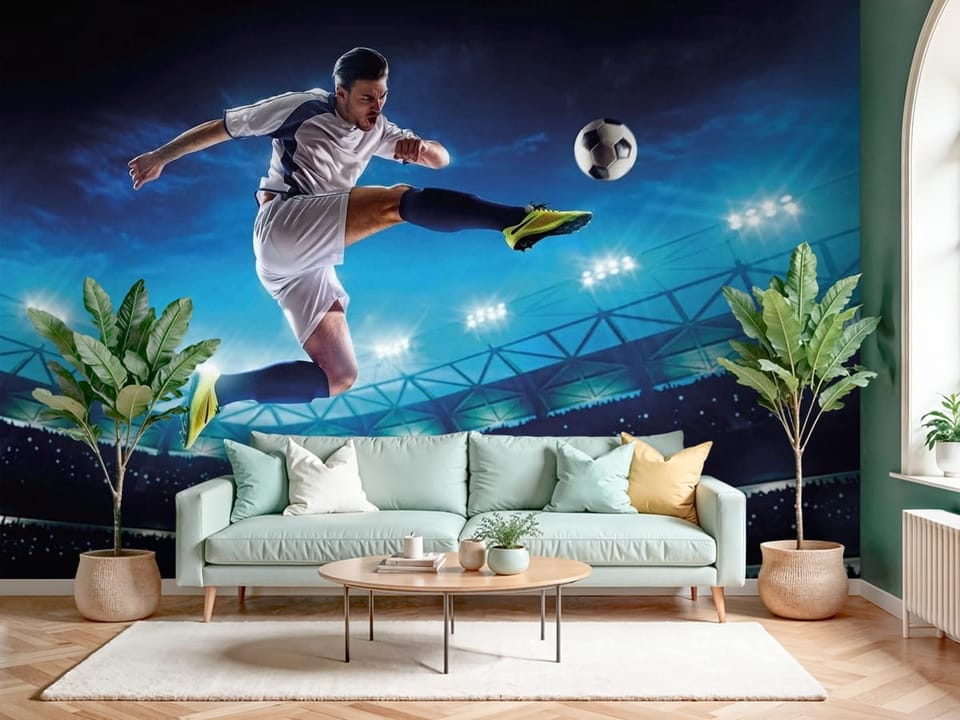 Fototapeta z piłkarzem kopiącym piłkę na oświetlonym stadionie nocą - ściana w pięknym salonie
