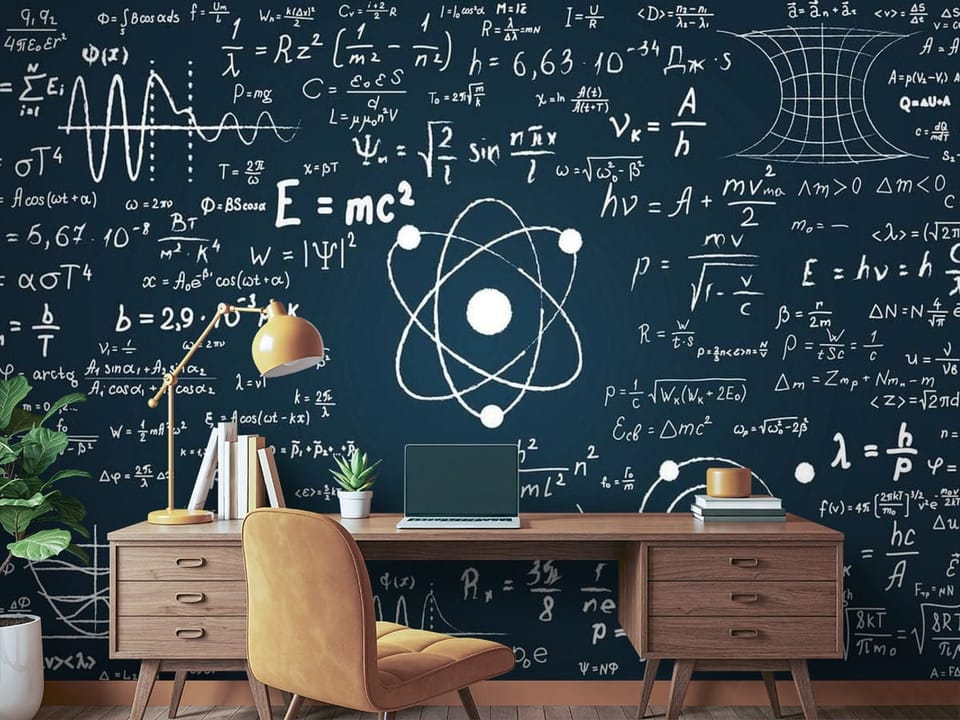 Fototapeta z atomem w centrum i wzorami matematycznymi na ciemnoniebieskim tle - biurko w pokoju nastolatka