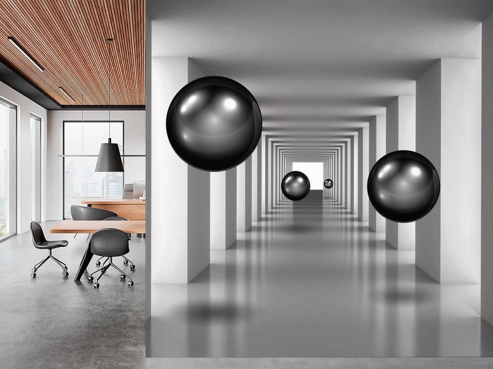 Fototapeta z czarnymi kulami w białym korytarzu o geometrycznych ścianach - ściana akcentowa w biurze