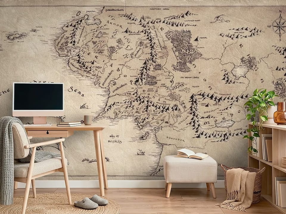 Fototapeta przedstawiająca starą mapę Śródziemia z konturami kontynentu i górami. - ściana w minimalistycznym pokoju nastolatka