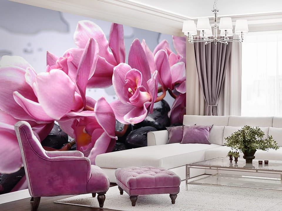 Fototapeta Różowe orchidee na kamieniach we wnętrzu salonu