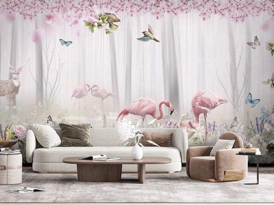 Fototapeta z flamingami w wodzie, otoczonymi kwiatami i drzewami. - widok na ścianę za kanapą w salonie