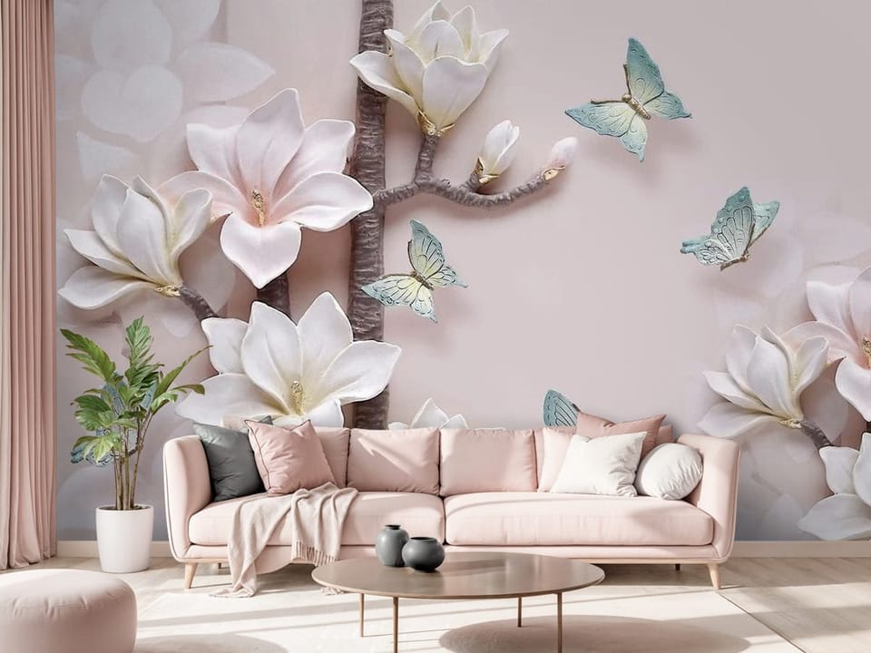 Fototapeta z gałęzią magnolii i niebieskimi motylami na jasnym tle - salon w różowych kolorach