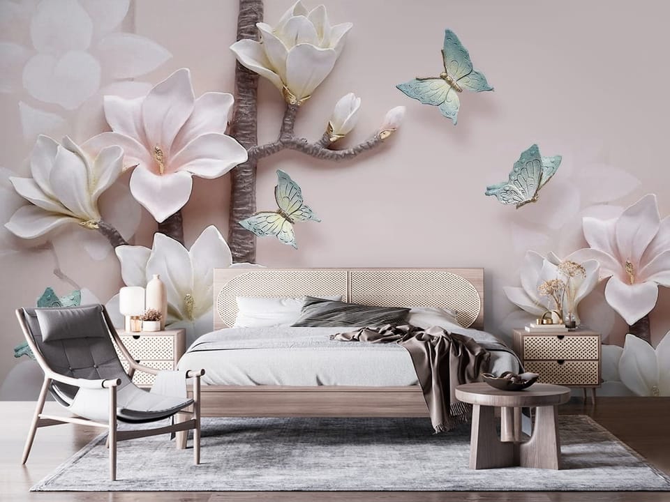 Fototapeta z gałęzią magnolii i niebieskimi motylami na jasnym tle - nowoczesna ściana w nasłonecznionej sypialni