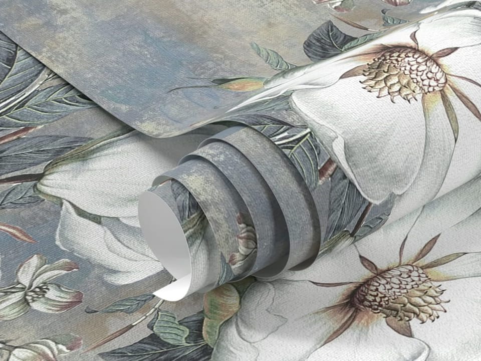 Fototapeta Magnolie na gałęzi z zielonymi liśćmi - realne zdjęcie w rolce