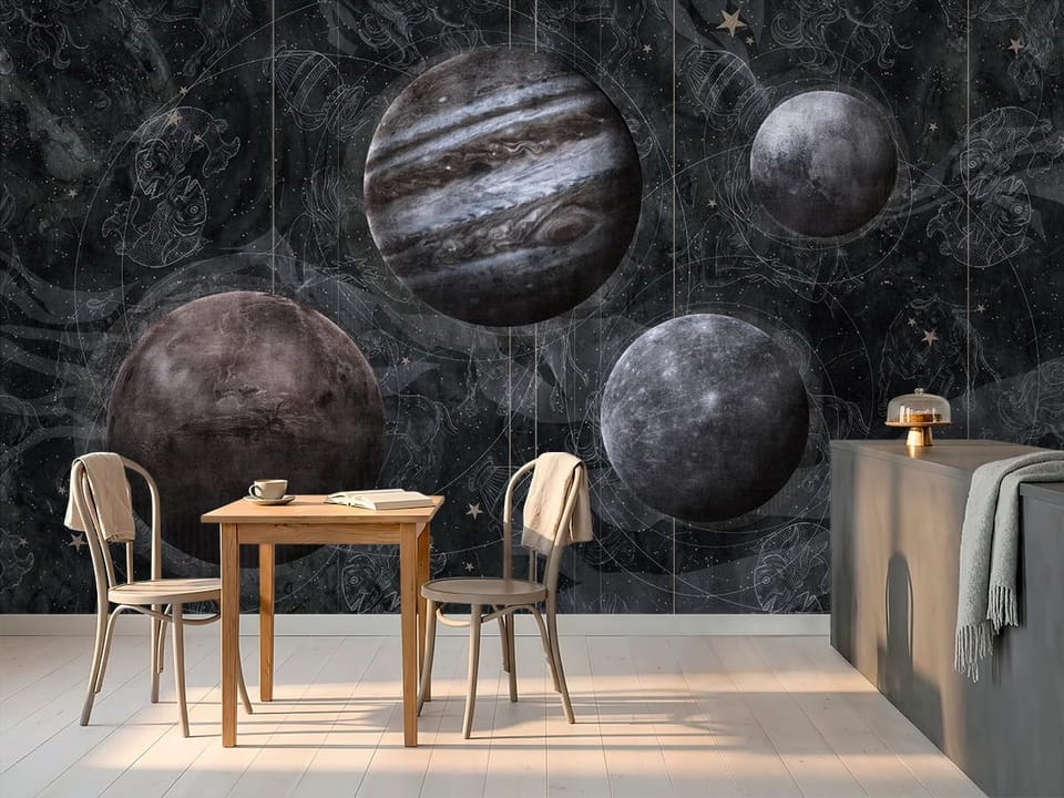 Fototapeta z czterema planetami na ciemnym tle z gwiazdami - widok na ścianę w minimalistycznej kawiarni