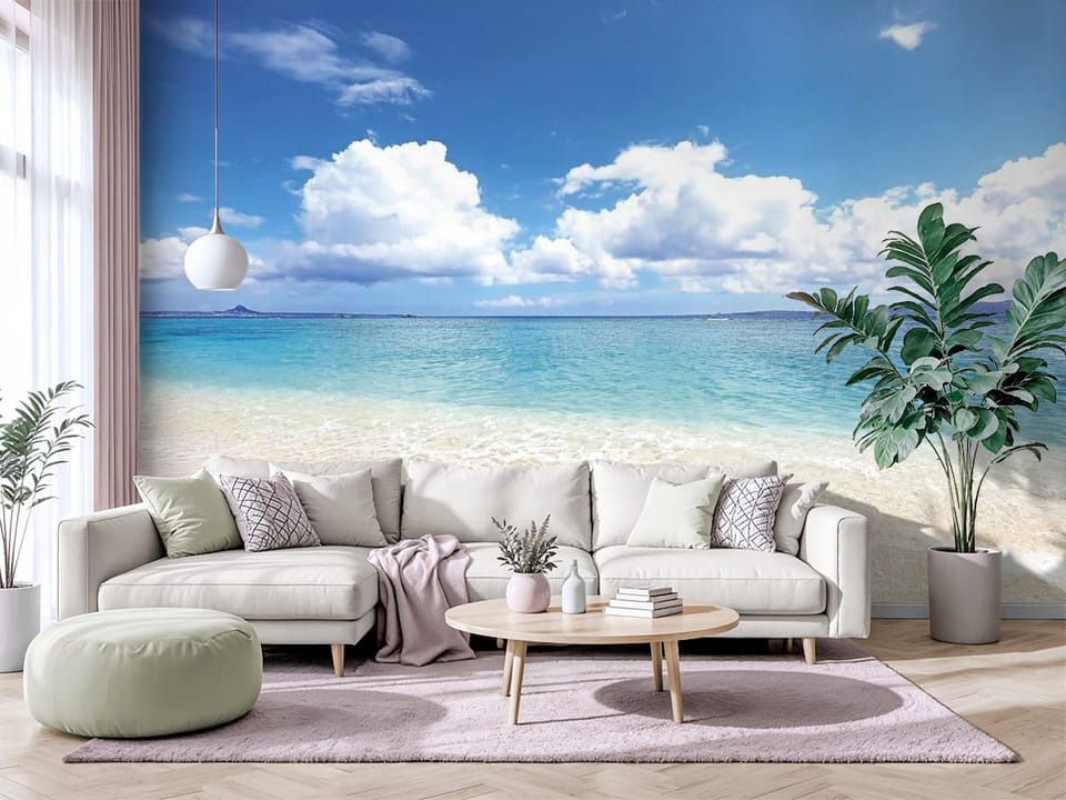 Fototapeta przedstawiająca piaszczystą plażę, błękitne morze i góry na horyzoncie - salon w jasnych barwach z modnym akcentem