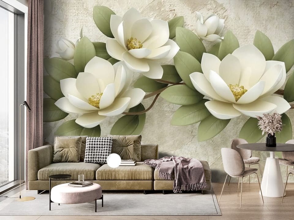 Fototapeta z białymi magnoliami na gałęzi z zielonymi liśćmi - ściana akcentowa w salonie z dużym oknem