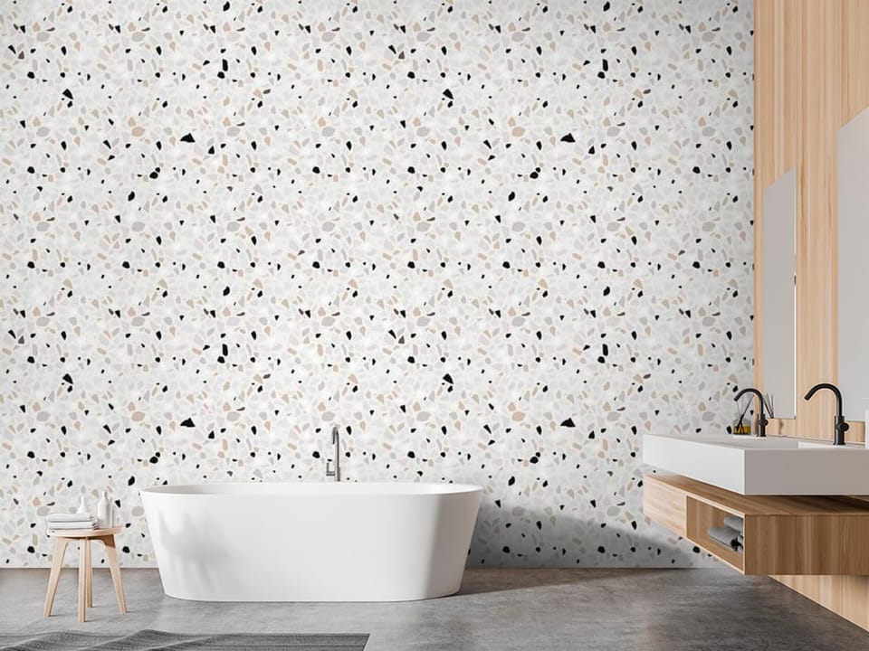 Fototapeta z wzorem terrazzo, drobne kamienie, jasne tło - inspiracja do pięknej łazienki