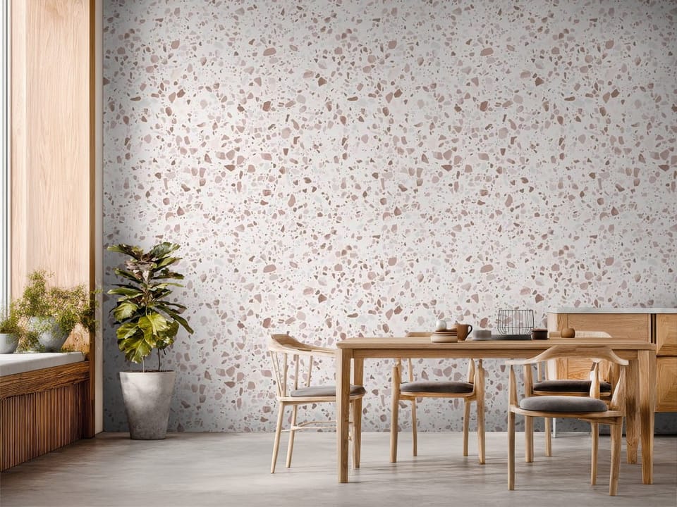 Fototapeta z wzorem terrazzo, różowe i brązowe kamienie na białym tle - inspiracja do strefy jadalnianej w kuchni