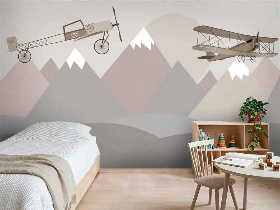 Fototapeta z dwoma starymi samolotami nad geometrycznymi górami - inspiracja do pokoju dziecka