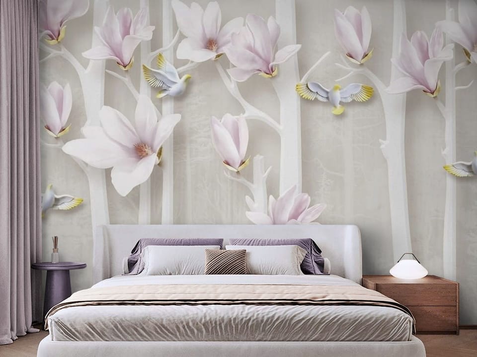 Fototapeta z różowymi kwiatami magnolii na białych gałęziach - przytulna aranżacja w sypialni