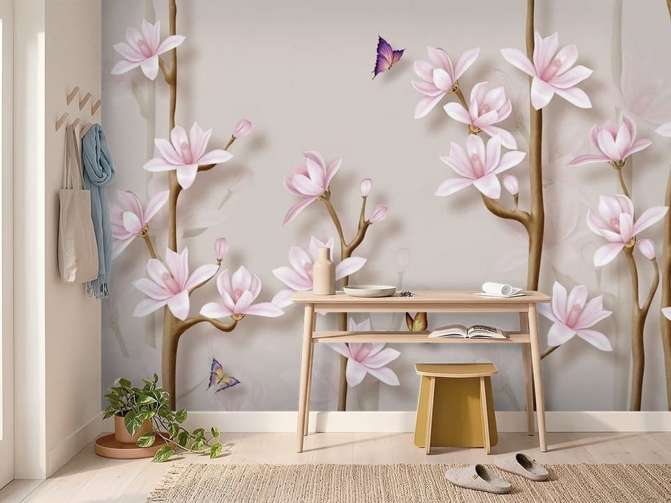 Fototapeta z kwiatami magnolii na brązowych gałęziach i jasnym tle - inspiracja do przytulnego przedpokoju