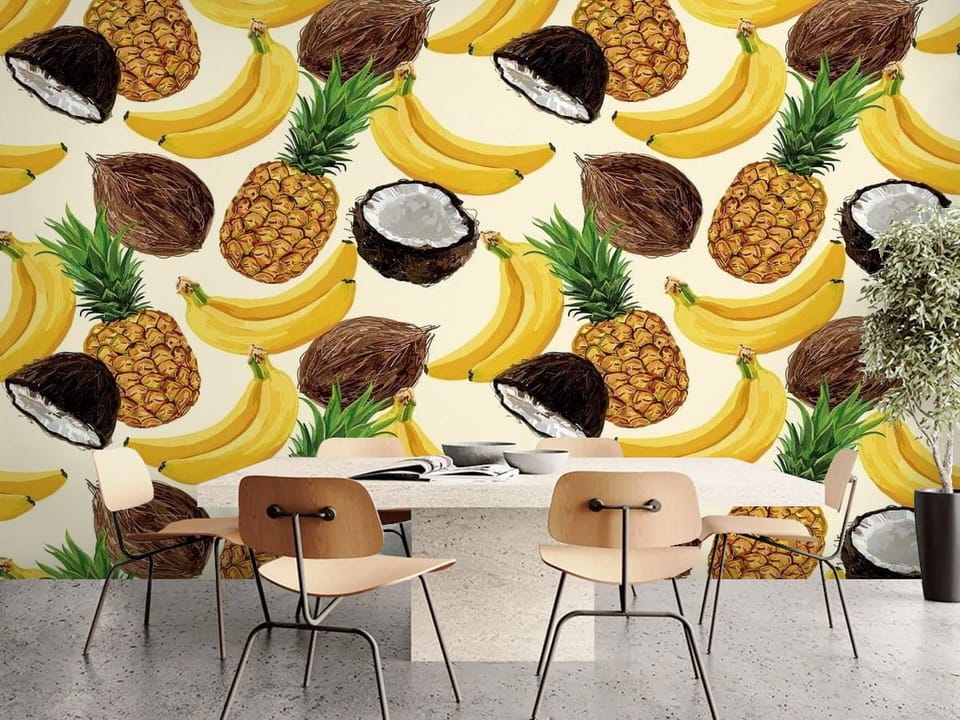 Fototapeta z bananami, ananasami i kokosami na jasnym tle - ściana przy stole w nowoczesnej kuchni