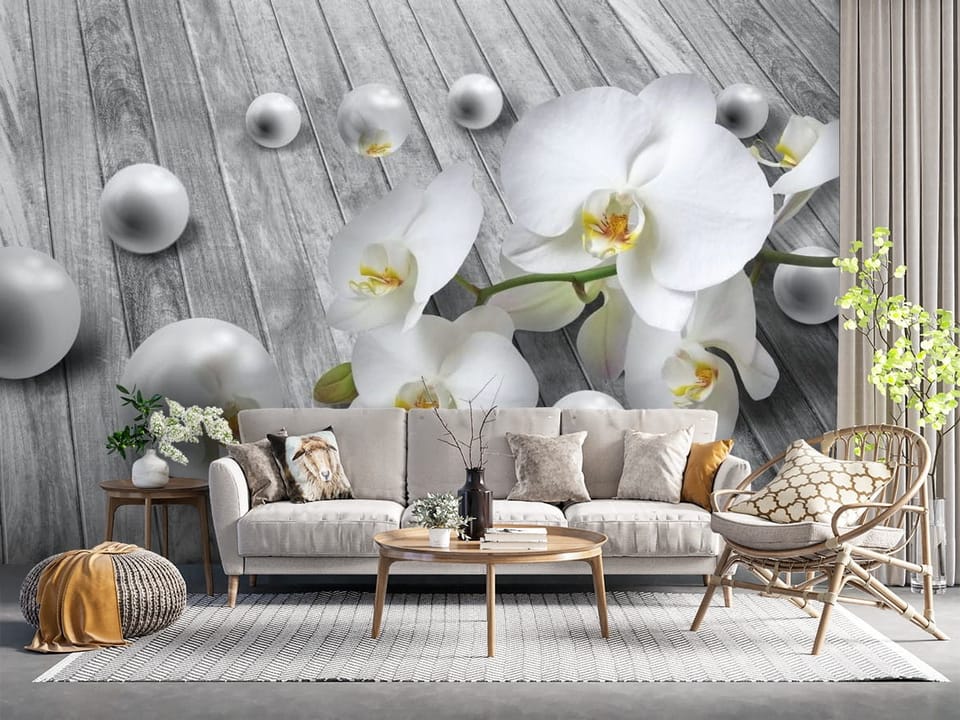Fototapeta z białymi orchideami na tle szarych desek z perłowymi kulami - salon z naturalnymi dodatkami