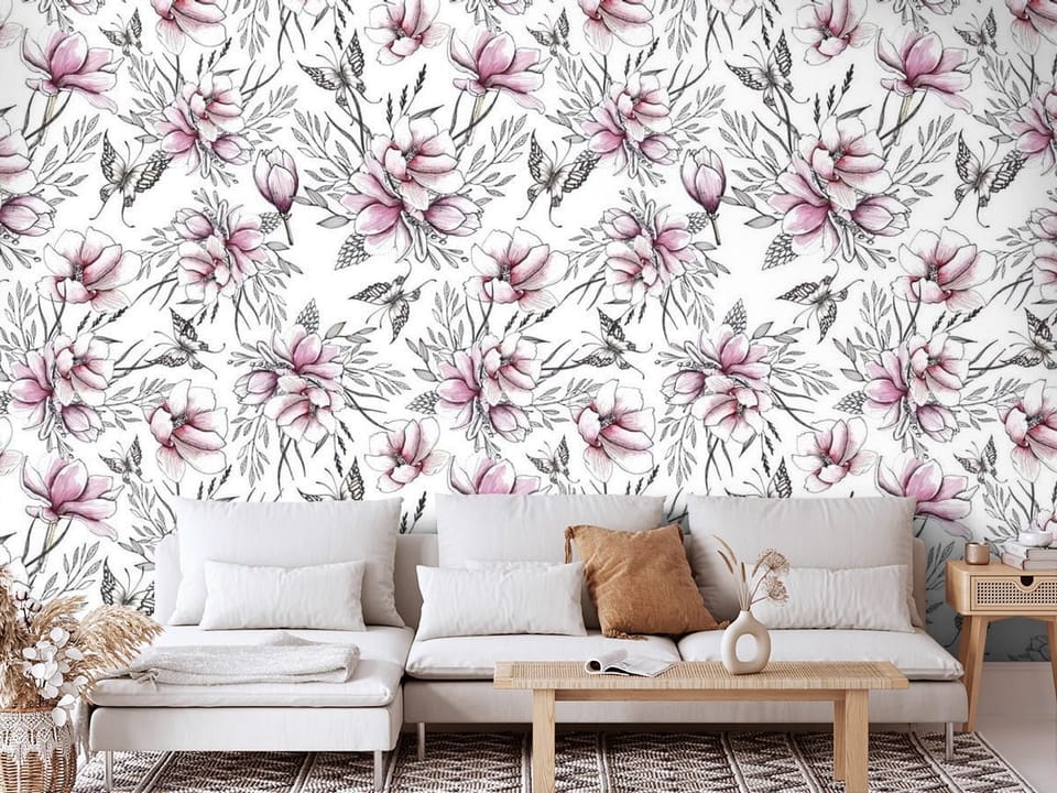 Fototapeta z kwiatami magnolii i delikatnymi liśćmi na białym tle - aranżacja głównej ściany w salonie