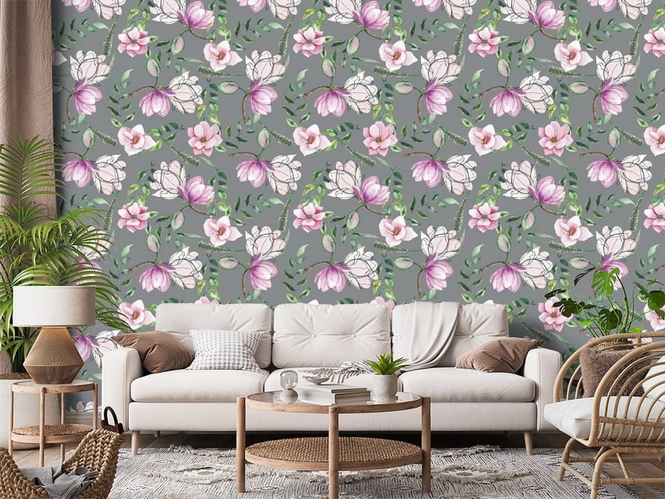 Fototapeta z różowymi magnoliami i zielonymi liśćmi na szarym tle - aranżacja ściany akcentowej w salonie