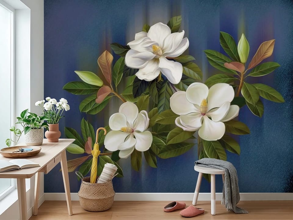 Fototapeta z białymi kwiatami magnolii i zielonymi liśćmi na niebieskim tle - widok na ścianę w przedpokoju