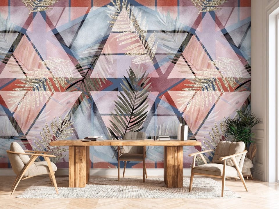 Fototapeta z geometrycznymi wzorami i pastelowymi liśćmi - ściana w biurze za dużym biurkiem
