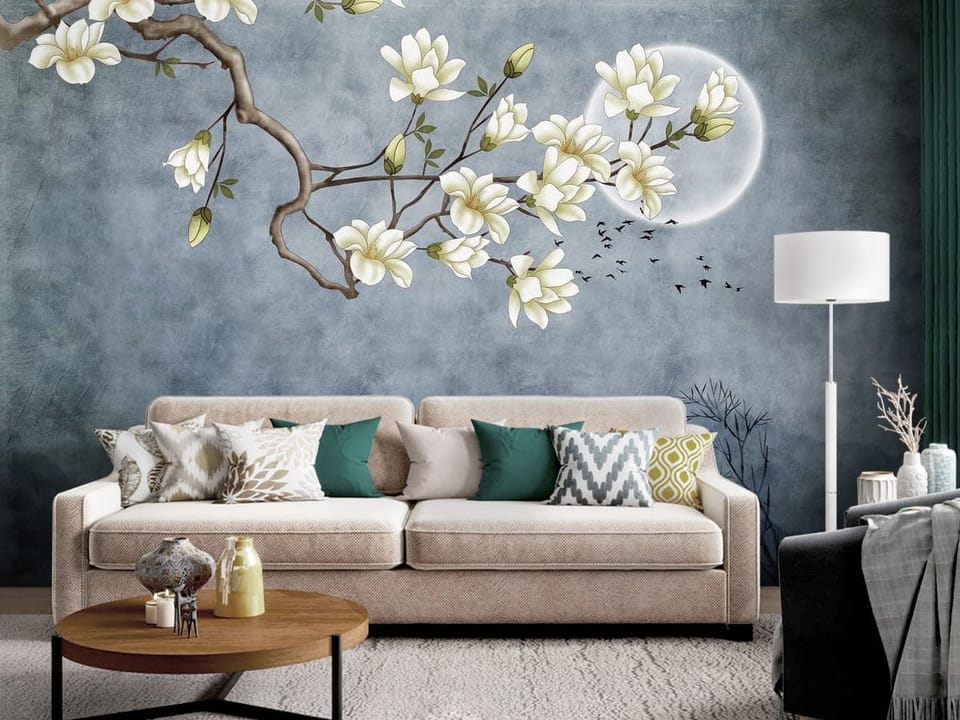 Fototapeta z gałęzią magnolii na tle księżyca i drzew - dekoracja ściany za kanapą w salonie