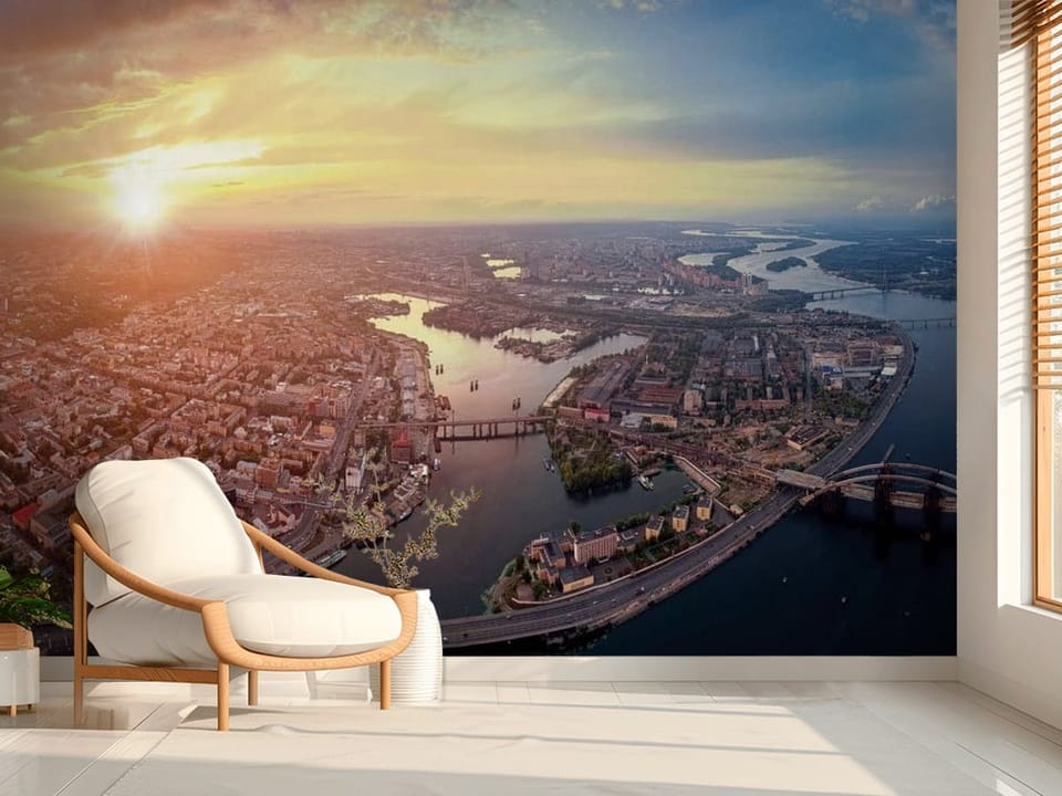 Fototapeta przedstawiająca panoramę miasta z szeroką rzeką i mostami o zachodzie słońca - aranżacja przytulnego przedpokoju