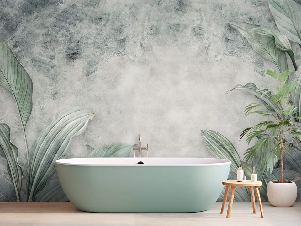 Fototapeta z dużymi zielonymi liśćmi na szarym tle, liście po bokach - widok za wanną w łazience