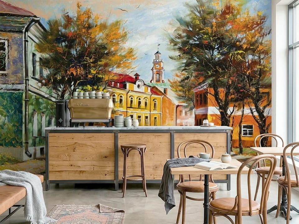Fototapeta z jesienną ulicą, kolorowymi budynkami i wieżą z zegarem - nowoczesna inspiracja do kawiarni