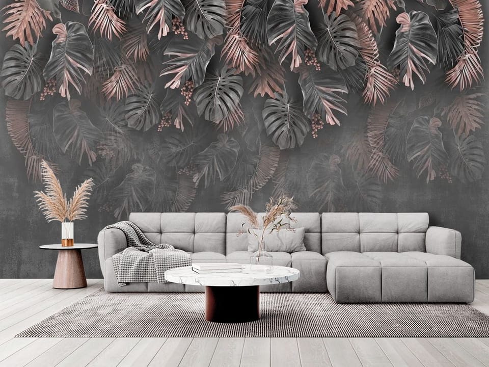 Fototapeta z tropikalnymi liśćmi w szarościach i różowymi akcentami - elegancki salon w stylu minimalistycznym