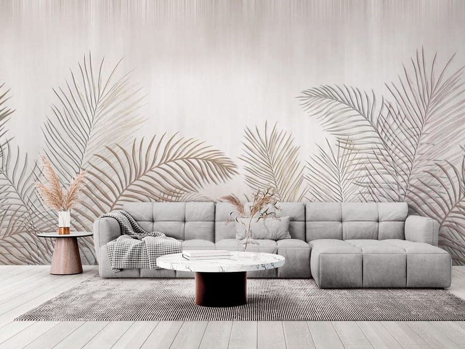 Fototapeta z delikatnymi liśćmi palmowymi na jasnym tle, subtelne przejścia kolorów - elegancki salon w stylu minimalistycznym