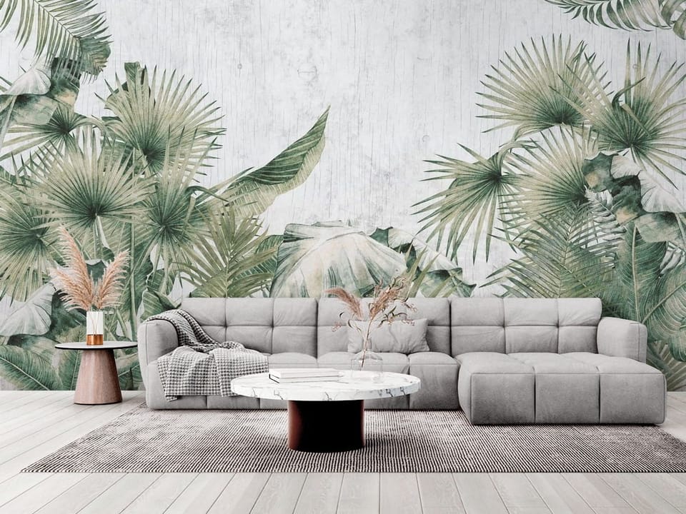 Fototapeta z tropikalnymi liśćmi na jasnym tle, różnorodne odcienie zieleni - elegancki salon w stylu minimalistycznym