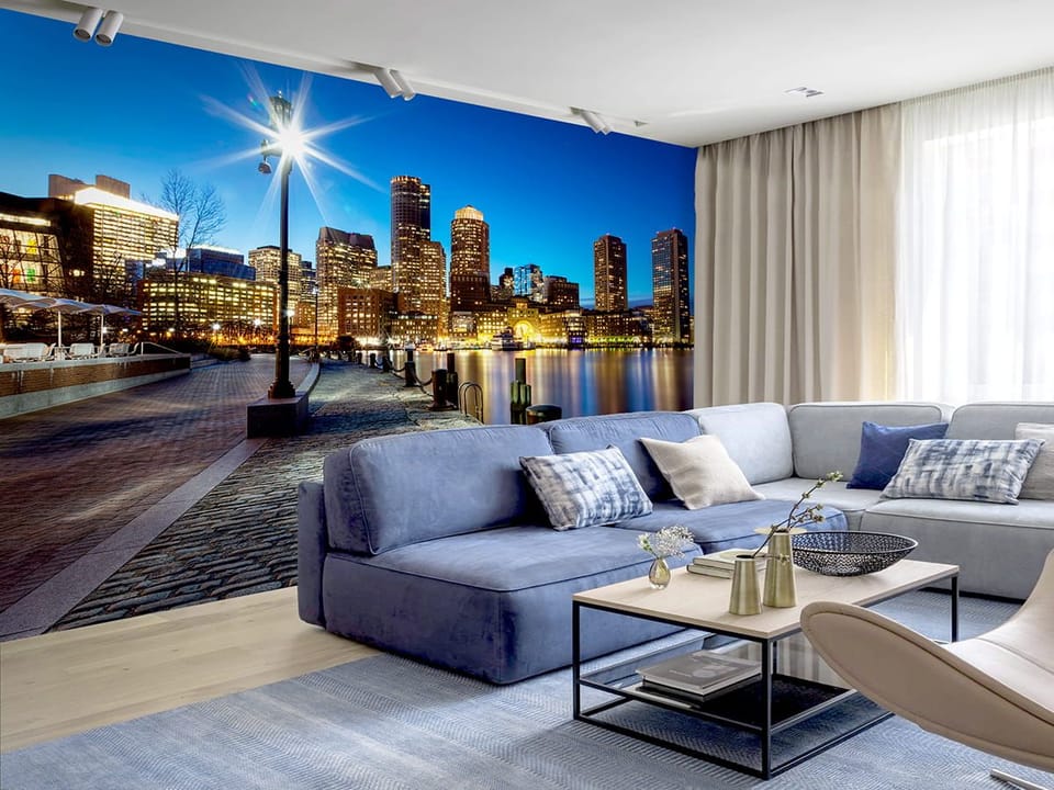 Fototapeta Panorama miasta nocą nad wodą we wnętrzu salonu