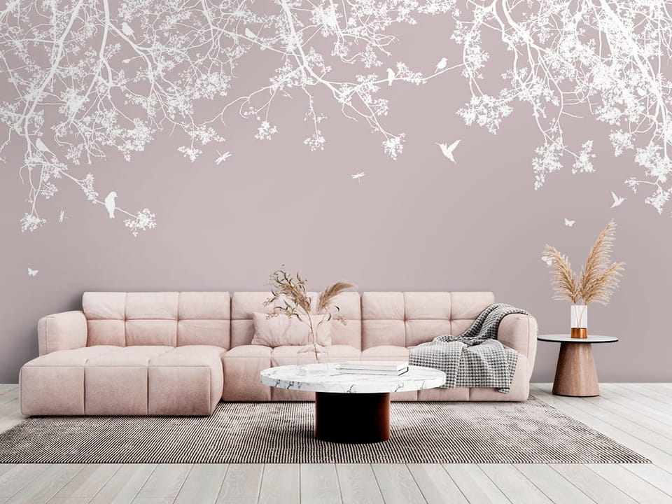 Fototapeta z gałęziami drzewa sakura i jednolitym tłem - salon w jasnych kolorach