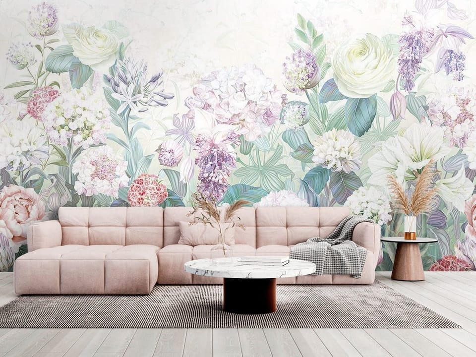 Fototapeta z pastelowymi kwiatami i zielonymi liśćmi na jasnym tle - salon w jasnych kolorach