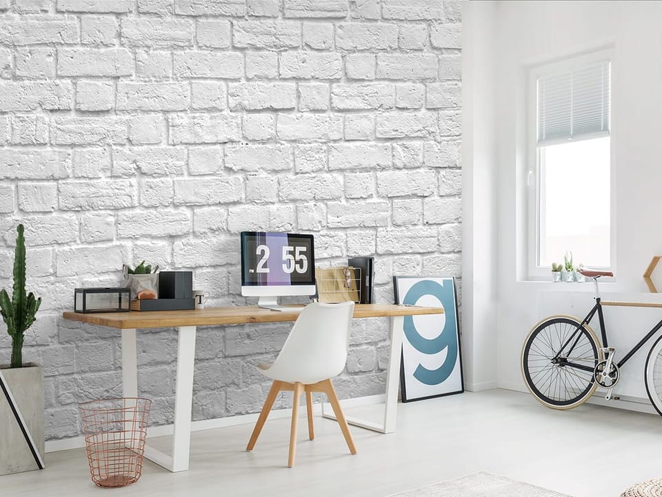 Fototapeta Biała ceglana ściana we wnętrzu biura