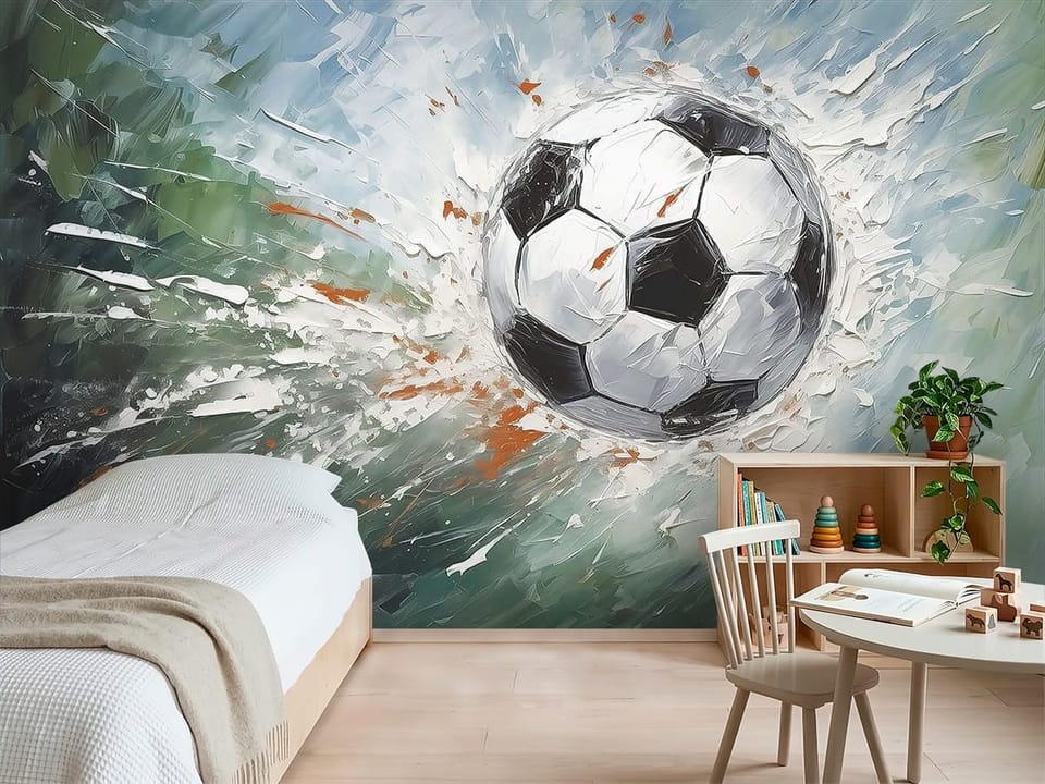 Fototapeta z piłką nożną w dynamicznym ruchu i rozpryskami farby - inspiracja do pokoju dziecka